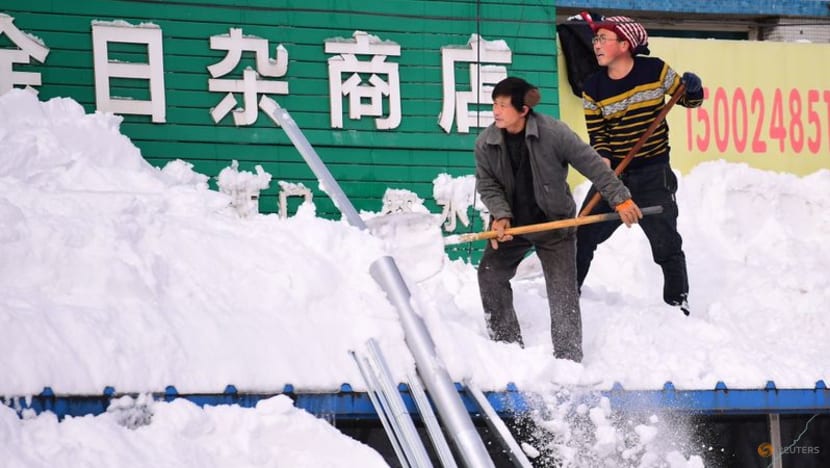 Parts of northeast China hit by record snowfall 