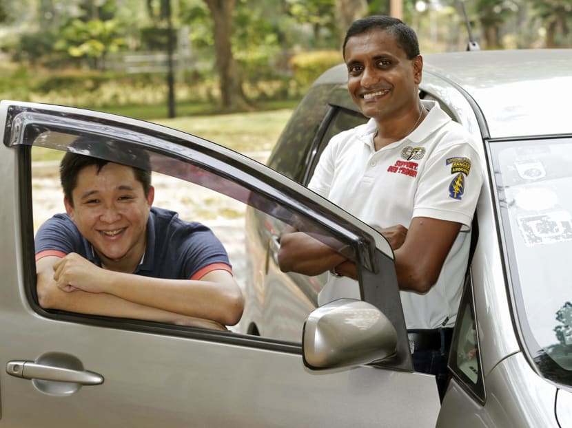Uber drivers Wilfred Goh (left) and Patrick Pereira (right). Mr Pereira, who owns an aerial service business, said Uber offered him greater flexibility and fewer restrictions compared with being a cabbie. Photo: Wee Teck Hian