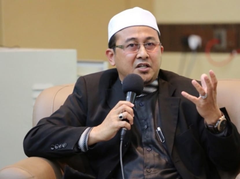 Dr Azhar Abdullah, a member of Kelantan’s hudud implementation committee, speaks at a forum organised by the University of Malaya Muslim Students Association, April 1, 2015. Photo: Malay Mail Online