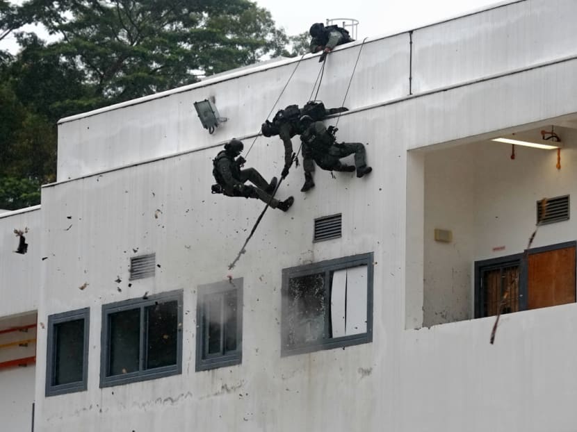 Special Tactics & Rescue (STAR) Unit using explosives to breach a window during a demonstration of a joint counter-terrorism exercise by the Singapore Police Force and the Singapore Civil Defence Force at the Home Team Tactical Centre on Feb 2, 2018. Photo: Nuria Ling/TODAY