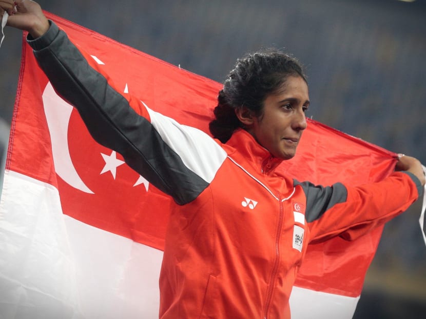 Veronica Shanti Pereira reacts during the victory ceremony at the SEA Games womens 200m. The Singaporean athlete failed to defend her gold medal and took home the bronze medal. Photo: Jason Quah/TODAY