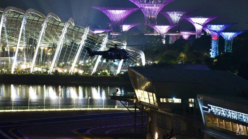 SAF special ops troopers fast rope off helicopters at F1 pit building in counter-terrorism exercise