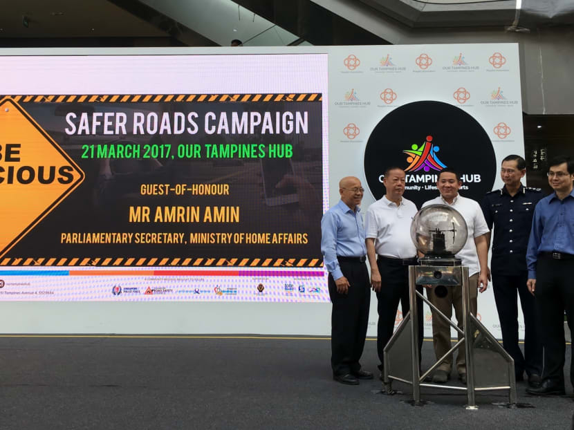 From left: Singapore Kindness Movement's William Wan; Singapore Road Safety Council's Bernard Tay; Parliamentary Secretary (Home Affairs) Amrin Amin; Traffic Police commander Sam Tee; and Land Transport Authority's Chin Kian Keong, launching the 2017 Safer Roads campaign. Photo: Kenneth Cheng