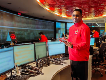 Mr Vigneshwaran Gunasegaran, a track access controller, is seen here at a SMRT operations control centre.  