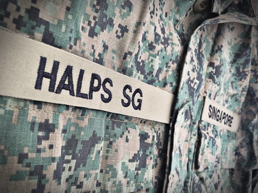 A marketing photo of HALPS, a firm which proposes laundry, packaging and storage services for NSmen during their ICT - for a fee.