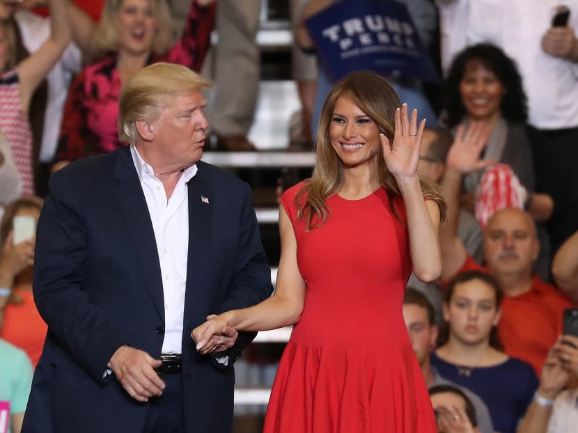 First Lady Melania Trump (right) with President Donald Trump at the rally in Florida. Photo: AFP