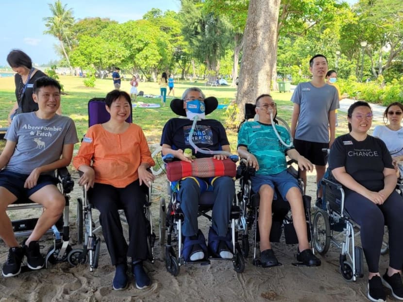 Patients who have motor neuron disease, their family members and caregivers as well as volunteers gathered at East Coast Park in May 2022. Patients who have motor neuron disease, their family members and caregivers as well as volunteers gathered at East Coast Park in May 2022.