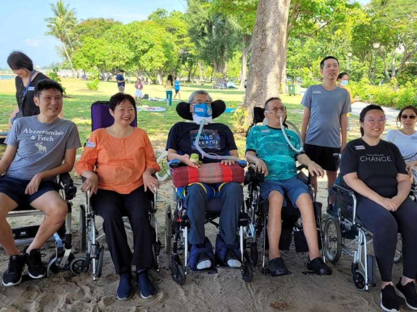 Patients who have motor neuron disease, their family members and caregivers as well as volunteers gathered at East Coast Park in May 2022.