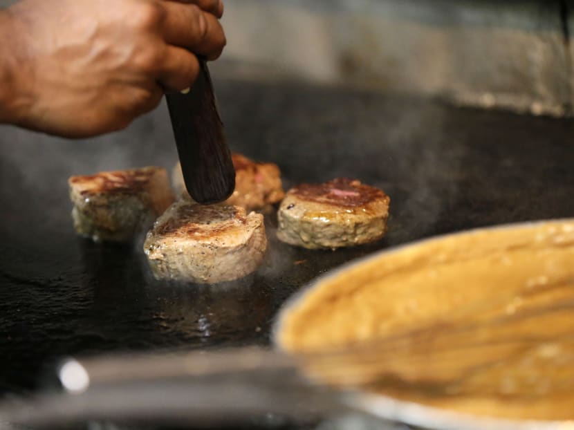 Filet of beef is grilled at Antoine's Restaurant in New Orleans, Sept 11, 2015. Photo: AP