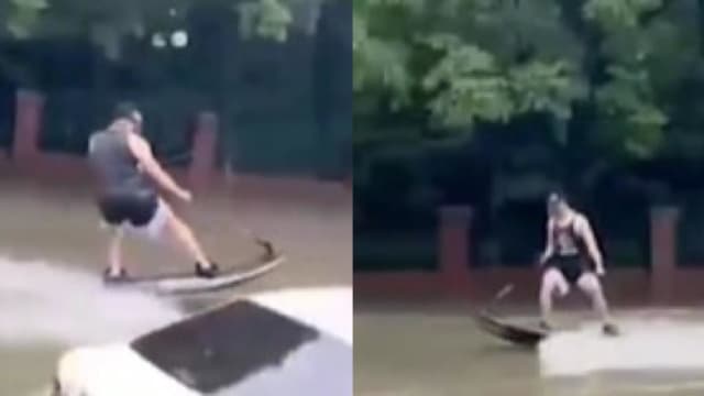 暴雨后积水严重 中国男子踩动力冲浪板上班