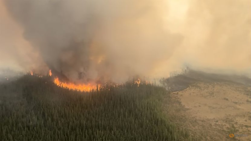Canadian PM Trudeau visits Alberta as wildfires rage