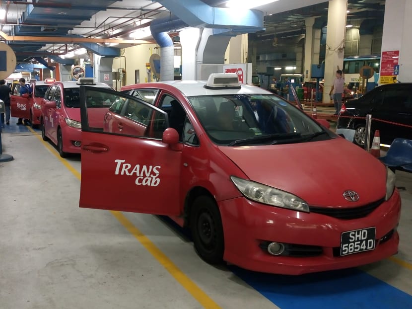 Trans-Cab taxis are seen here at a vehicle inspection centre. Photo: Faris Mokhtar/TODAY