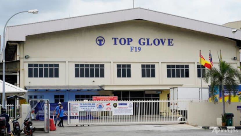 Businesses and residents near Top Glove dormitories on edge, as COVID-19 cases spike among workers Businesses and residents near Top Glove dormitories on edge, as COVID-19 cases spike among workers