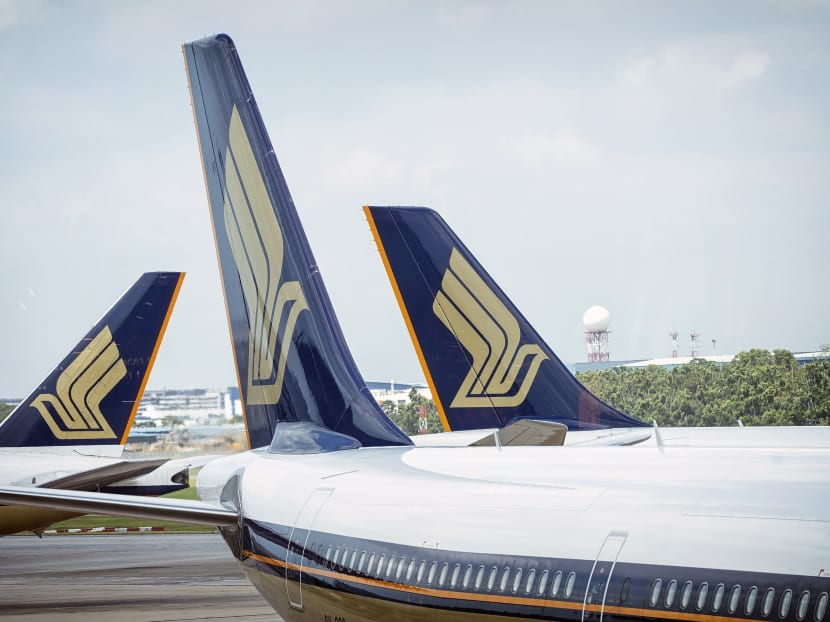 Singapore Airlines aircraft sit at Changi Airport in Singapore, on Thursday, March 3, 2016. Photo: Bloomberg