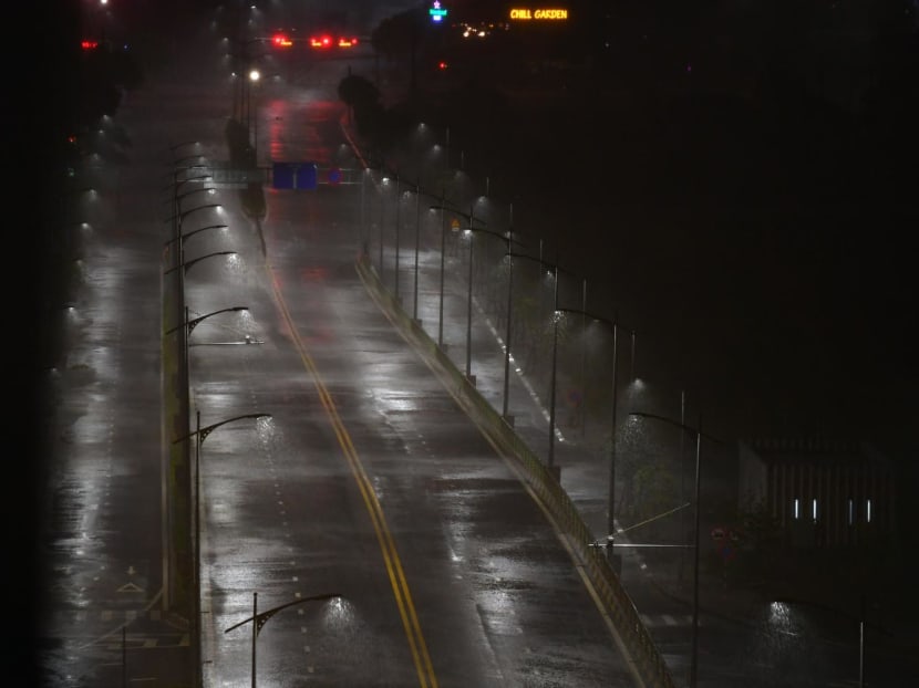 Heavy rain from Typhoon Noru falls on an empty road in Danang on Sept 27, 2022. Heavy rain from Typhoon Noru falls on an empty road in Danang on Sept 27, 2022.