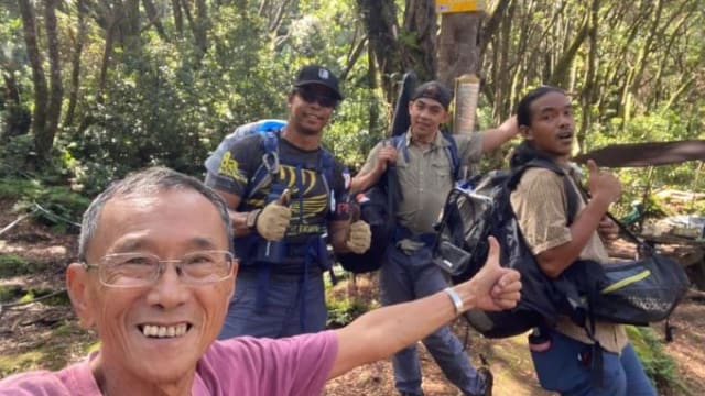 理解问答：80岁狮城老翁登上菲律宾最高峰