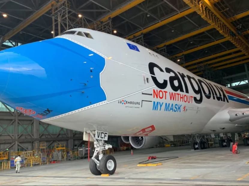 The 747-8 freighter had a surgical mask painted onto its nose-door to emphasise the importance of protective gear in the fight against Covid-19.