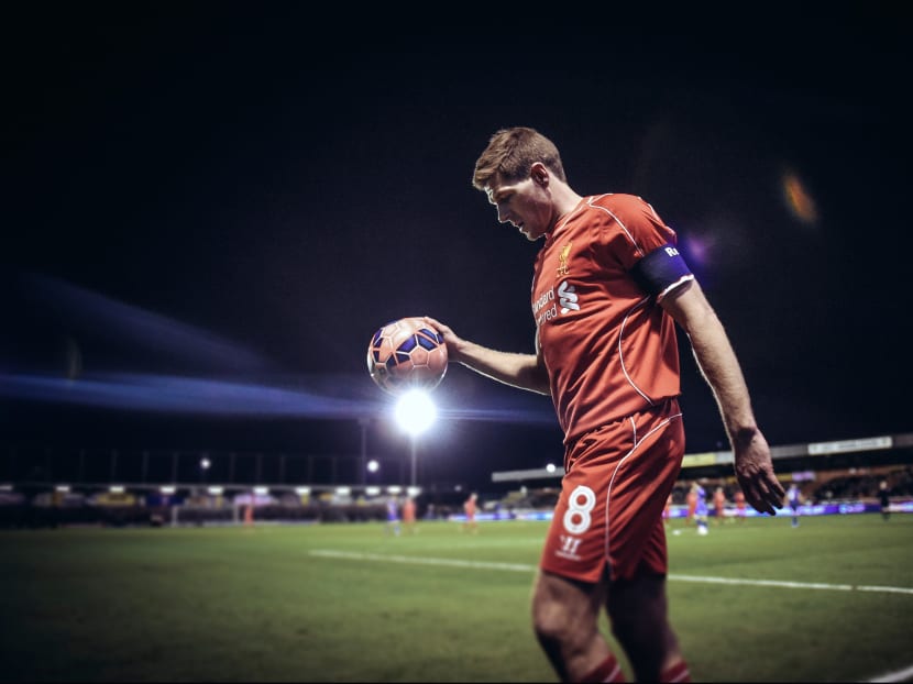 Steven Gerrard of Liverpool prepares to take a corner during the FA Cup Third Round match between AFC Wimbledon and Liverpool at The Cherry Red Records Stadium on January 5, 2015 in Kingston upon Thames, England.  Photo: Getty Images