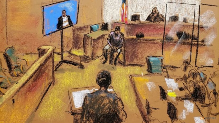 R. Kelly accuser says she saw a nearby gun while forced to have oral sex R. Kelly accuser says she saw a nearby gun while forced to have oral sex