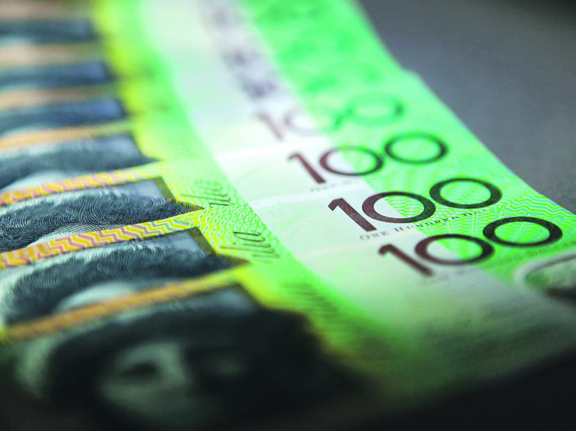 Australian one-hundred dollar banknotes. Photo: Bloomberg