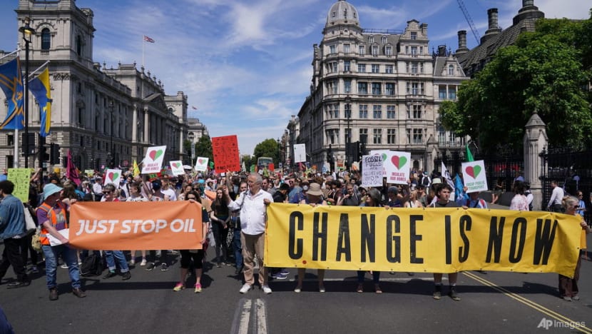 Protesters in UK decry climate change after record heatwave Protesters in UK decry climate change after record heatwave