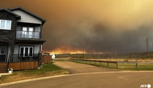 Canada's oil sands hub threatened by wildfire, sparking large evacuations