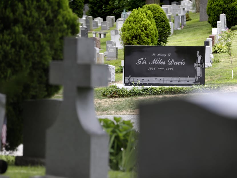 The gravestone of jazz great Miles Davis sits in the "Jazz Corner" at Woodlawn Cemetery in the Bronx section of New York, Wednesday, July 9, 2014. Photo: AP