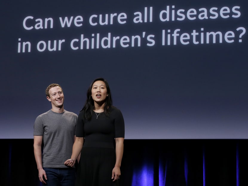 Facebook CEO Mark Zuckerberg, left, and his wife, Priscilla Chan, rehearse for a speech in San Francisco. Photo: AP