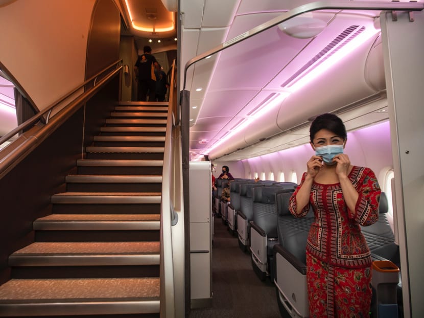 An SIA stewardess onboard an Airbus A380 temporarily converted into Restaurant A380@Changi on Oct 24, 2020.