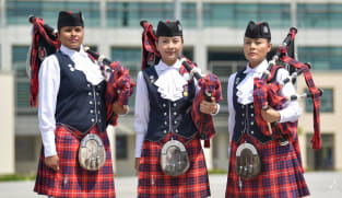 These members of the all-female Singapore police band can sing, dance and play the bagpipes