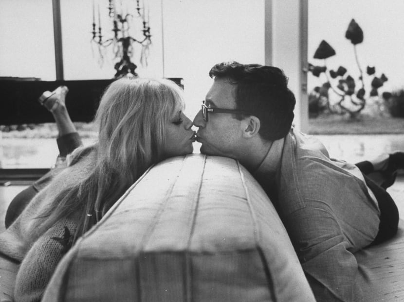 BEVERLY HILLS, UNITED STATES - MARCH 01: Peter Sellers and wife at home on the couch kissing. Photo: Allan Grant/The LIFE Images Collection/Getty Images
