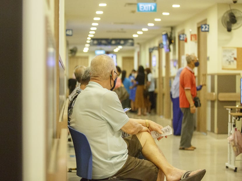 Patients wait for consultancy at the National University Polyclinic at Clementi on June 1, 2022.