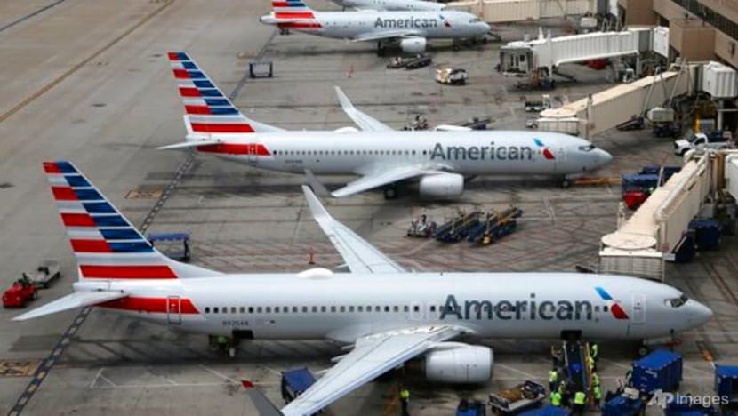 American Airlines posts US$1.25 billion loss, delays new jets American Airlines posts US$1.25 billion loss, delays new jets