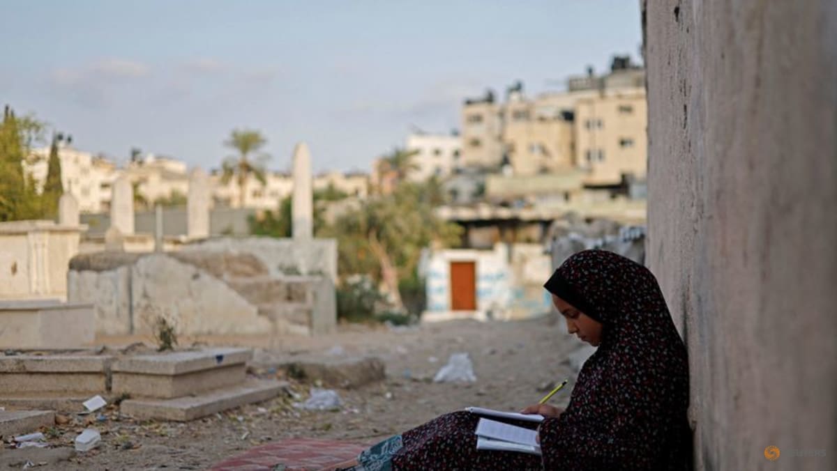 Gaza struggles to accommodate the living and the dead as population