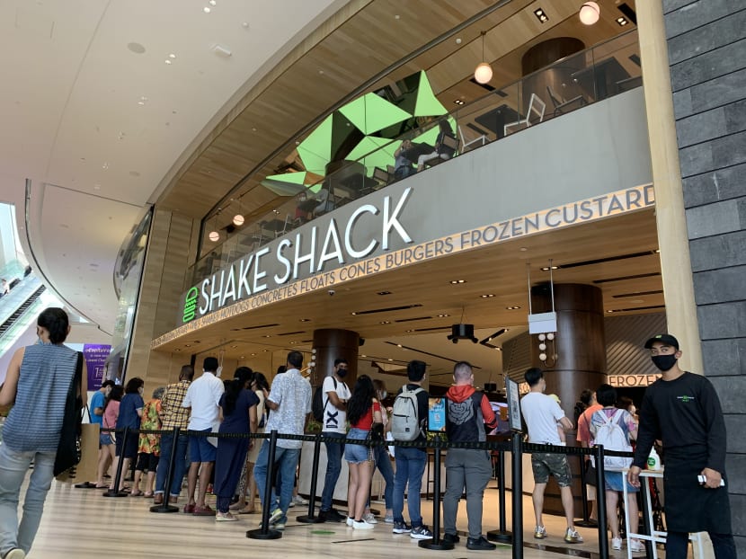 Diners queuing up to enter Shake Shack at Jewel Changi Airport on July 30, 2020. Diners queuing up to enter Shake Shack at Jewel Changi Airport on July 30, 2020.
