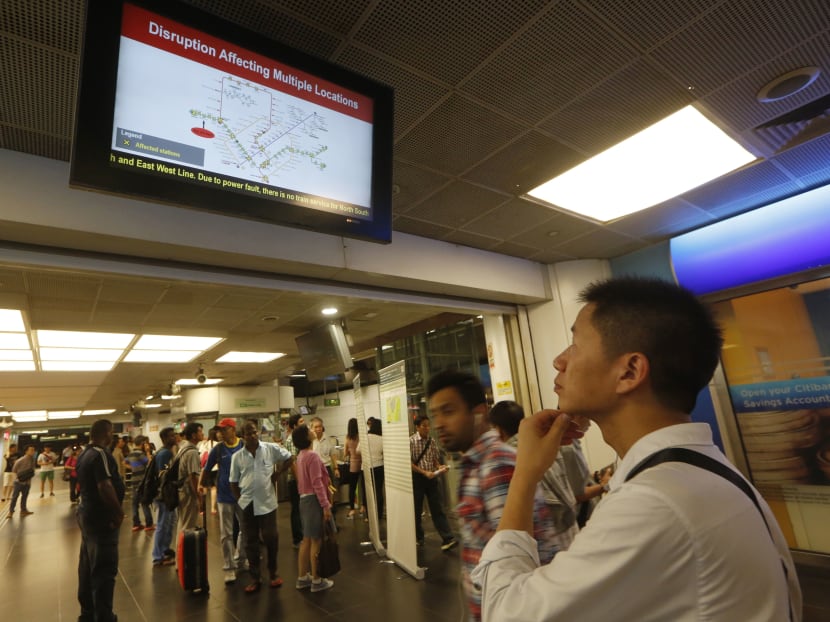 A display board at Boon Lay MRT station informs of train service disruption on the North South East West Lines (NSEWL) on 7 July 2015. Photo: Ooi Boon Keong/TODAY