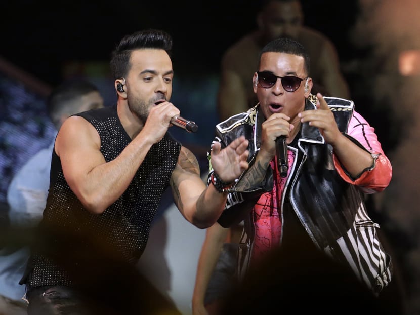 Singers Luis Fonsi, left and Daddy Yankee perform during the Latin Billboard Awards in Coral Gables, Fla. Universal Music Latin Entertainment announced Wednesday, July 19, 2017, that "Despacito" has become the most streamed song of all time with more than 4.6 billion plays six months after its release. Photo: AP