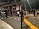 Screengrabs from a 14-second video posted by Facebook user Patrick Tan of the altercation which took place near Orchard Towers on Sunday (Aug 14) morning. 
