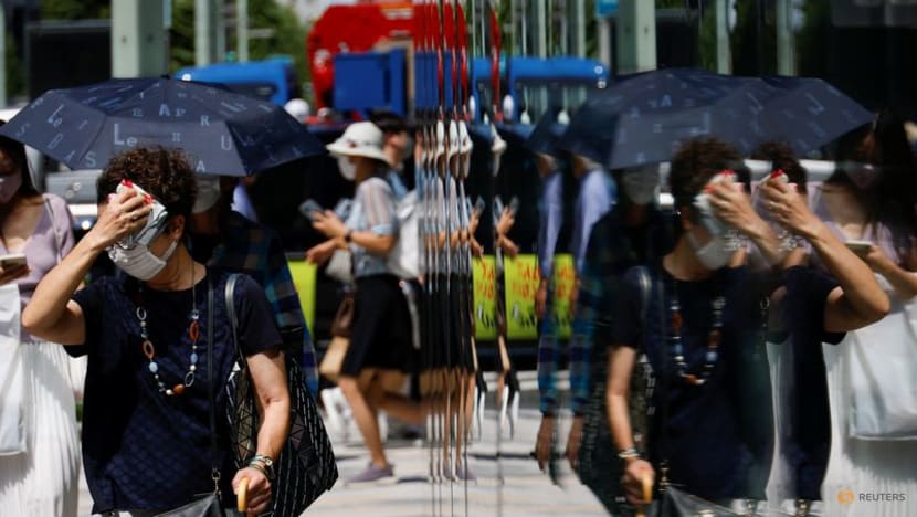 Japan's June flames out with record heat, but power crunch averted Japan's June flames out with record heat, but power crunch averted
