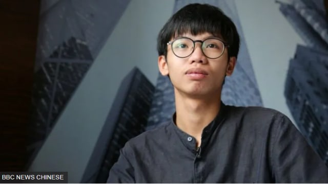 香港前学生组织领袖钟翰林违反监管令 逃往英国寻求政治庇护