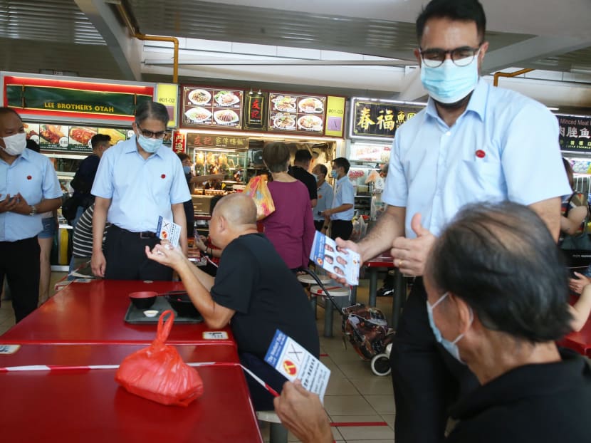 (Standing, from left to right): Mr Faisal Manap, Mr Leon Perera and Mr Pritam Singh of the Workers' Party on a walkabout in Aljunied GRC on July 2, 2020. (Standing, from left to right): Mr Faisal Manap, Mr Leon Perera and Mr Pritam Singh of the Workers' Party on a walkabout in Aljunied GRC on July 2, 2020.