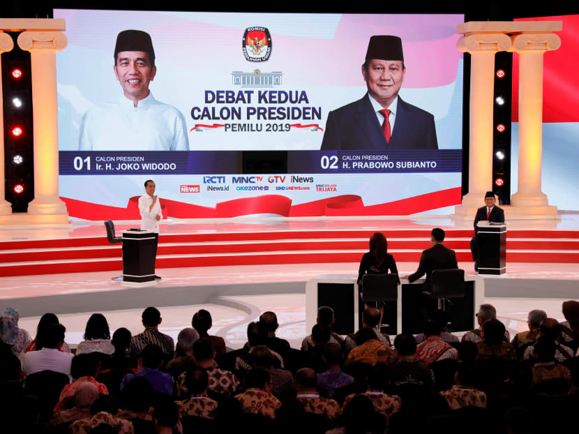 Indonesia's presidential candidate Joko Widodo (left) during a debate with his opponent Prabowo Subianto in Jakarta on Feb 17. Some members of Mr Widodo's current administration support a proposal for active members of the military to serve as civil servants.