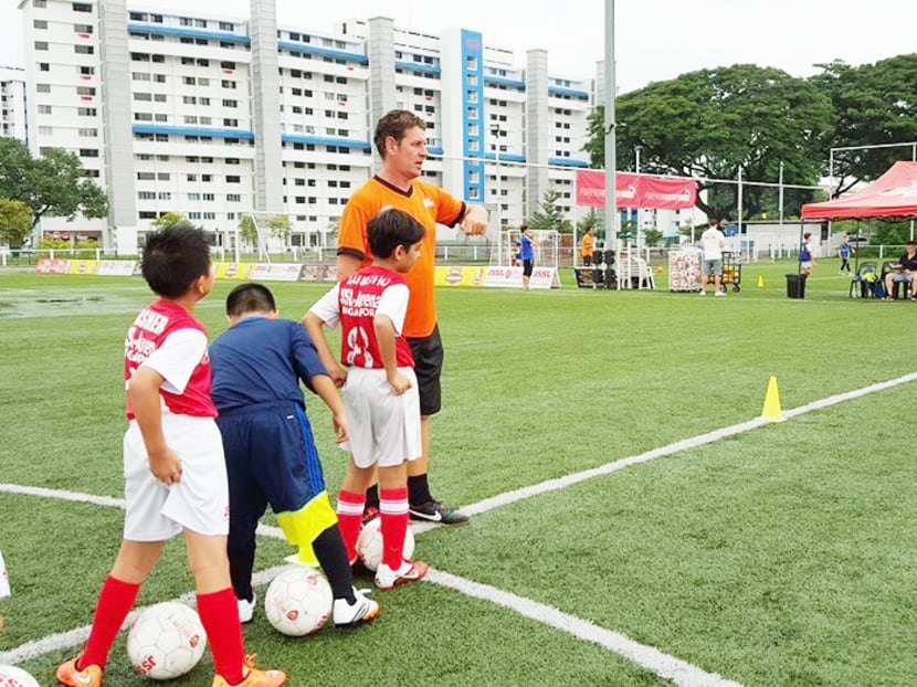 Children from JSSL Singapore football academy training at the HYFA facility at Mattar Road in 2015. The injunction has forced JSSL to relocate and significantly affected HYFA’s revenue, as JSSL used to conduct their activities at the 11-a-side pitches on weekends. Photo: HYFA/Facebook