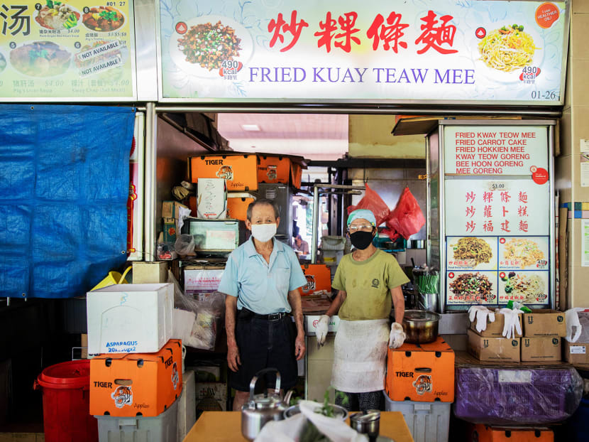 Mr Yeo Cheng Poh, 74, and Madam Toh Bong Chee, 73, who sell S$3 char kway teow and carrot cake at their stall, Fried Kuay Teaw Mee, at Seah Im Food Centre in the Harbourfront area, had resorted to working longer hours to make up for the shortfall in income.