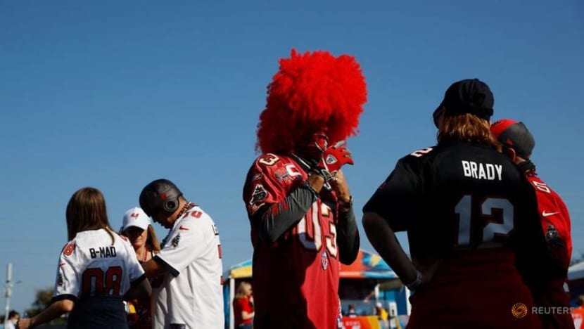 Mask-clad fans stream into Buccaneers' home stadium for Super Bowl unlike any other Mask-clad fans stream into Buccaneers' home stadium for Super Bowl unlike any other