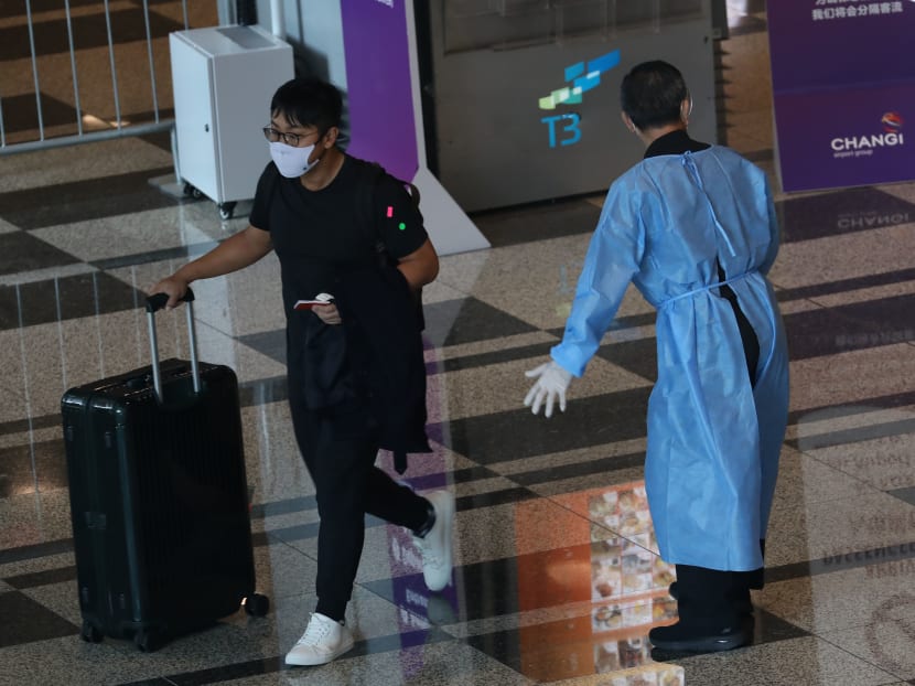 A passenger arriving at Changi Airport Terminal 3 under the vaccinated travel lane scheme on Oct 19, 2021.