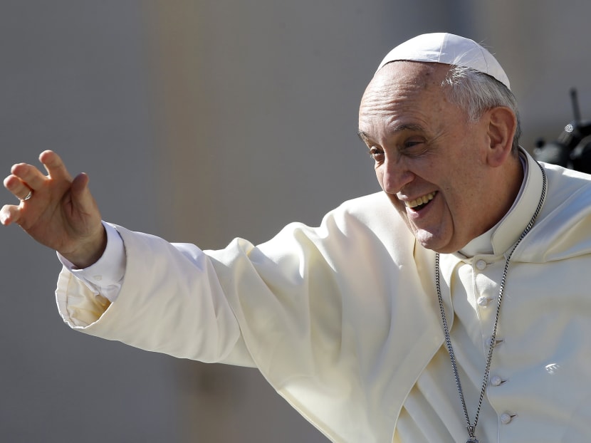 Pope Francis waves as he arrives to lead his Wednesday general audience in Saint Peter's square at the Vatican September 4, 2013.  Photo: Reuters
