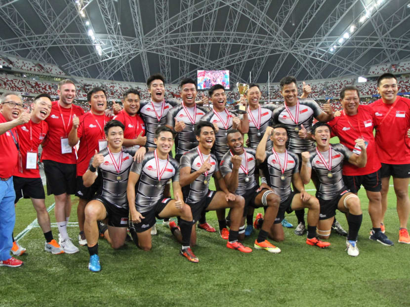 The Singapore men’s team celebrating the capture of their first ever SEA Sevens title. Photo: Rugby Singapore The Singapore men’s team celebrating the capture of their first ever SEA Sevens title. Photo: Rugby Singapore