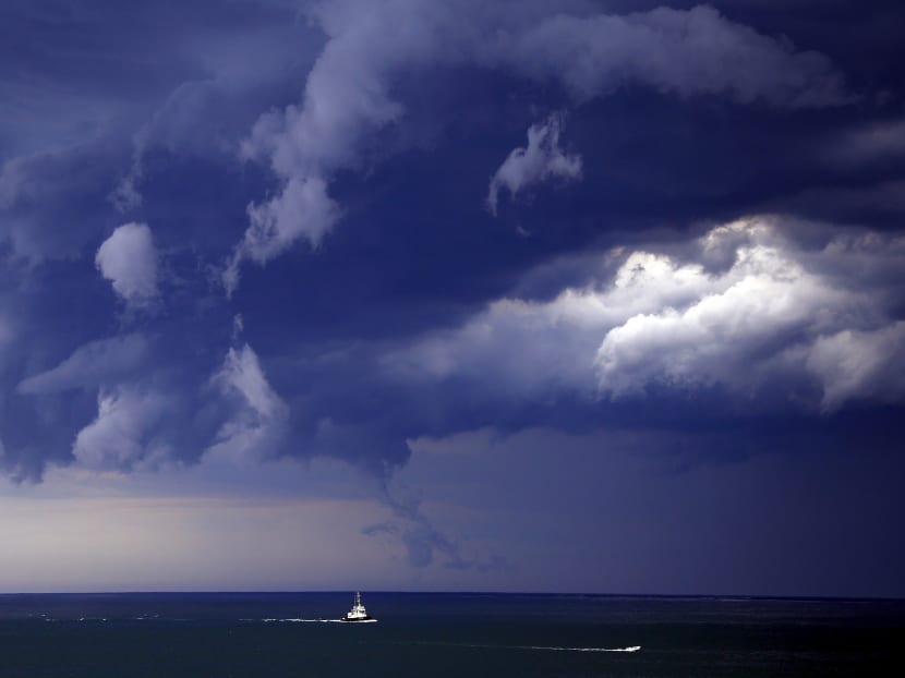 Boats head into shore as storm clouds move along the coast towards the city of Sydney, Australia. Reuters file photo