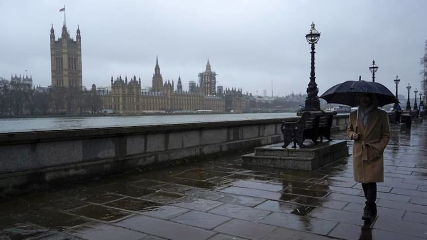UK economy shrinks but might avoid double-dip recession UK economy shrinks but might avoid double-dip recession